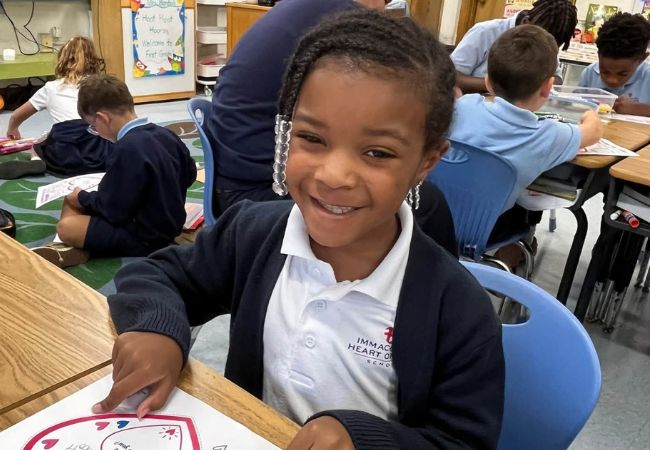 Student in a classroom at Immaculate Heart of Mary School in Towson, MD