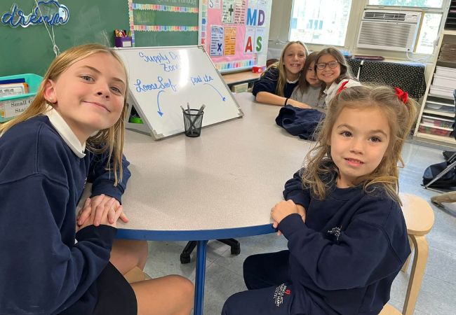 Students working together in an IHM classroom in Towson, Maryland